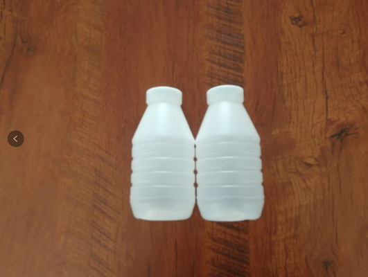 شیر 1000 میلی لیتری بطری پلاستیکی دمنده دستگاه 4 قالب چرخشی تمام اتوماتیک